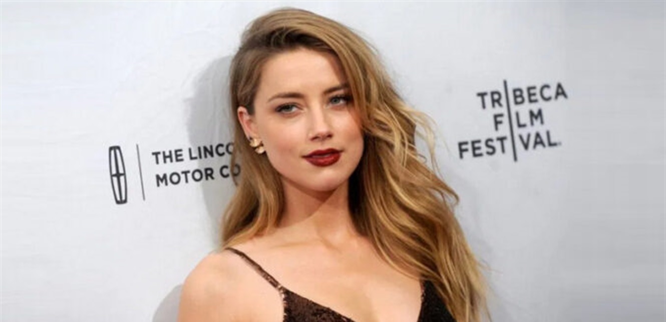 بيكيني أمبر هيرد يكشف عبارة غامضة على جسدها (صور) – بوابة مشاهير