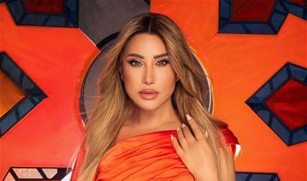برفقة زوجها الإماراتي.. نجوى كرم تُحيي حفلا في دبي وتتألق بفستان برتقالي (فيديو)