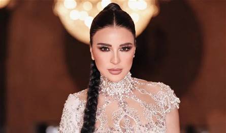 &quot;بالحرام&quot;.. ماغي بو غصن تشوّق الجمهور برقم وباب مغلق  (صورة)