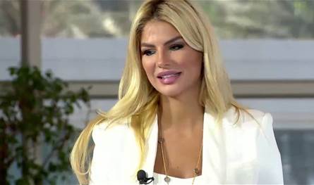 مكياج أحمر وستايل شتوي… ساندرا رزق تتألق بإطلالة عصرية