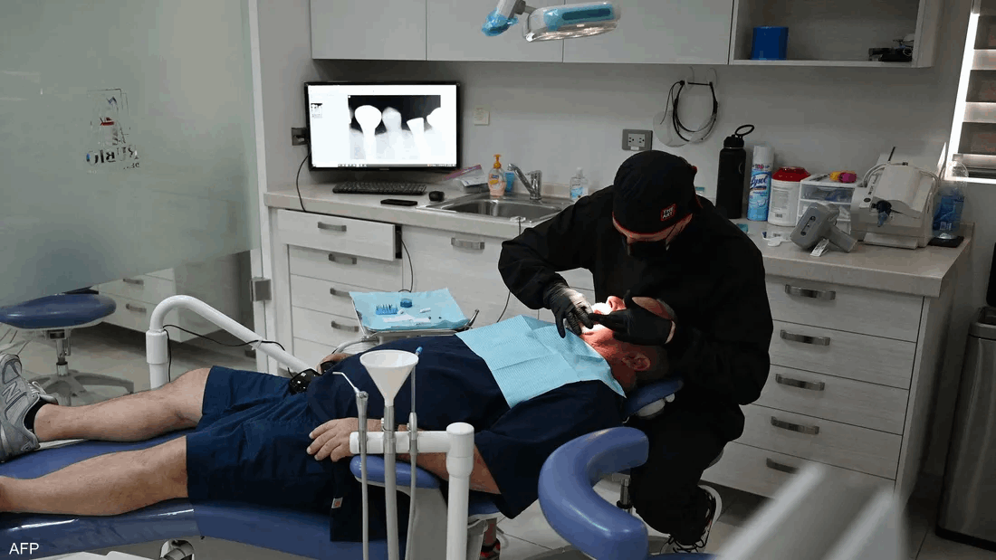 Why do some dental implants fail despite antibiotics?