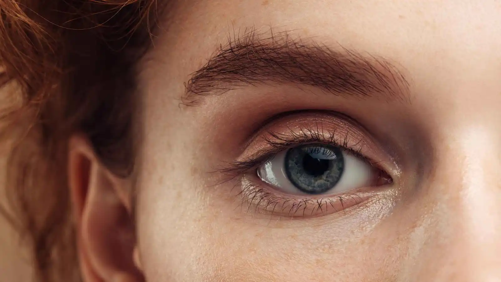 Why does speaking aloud dilate the pupil?